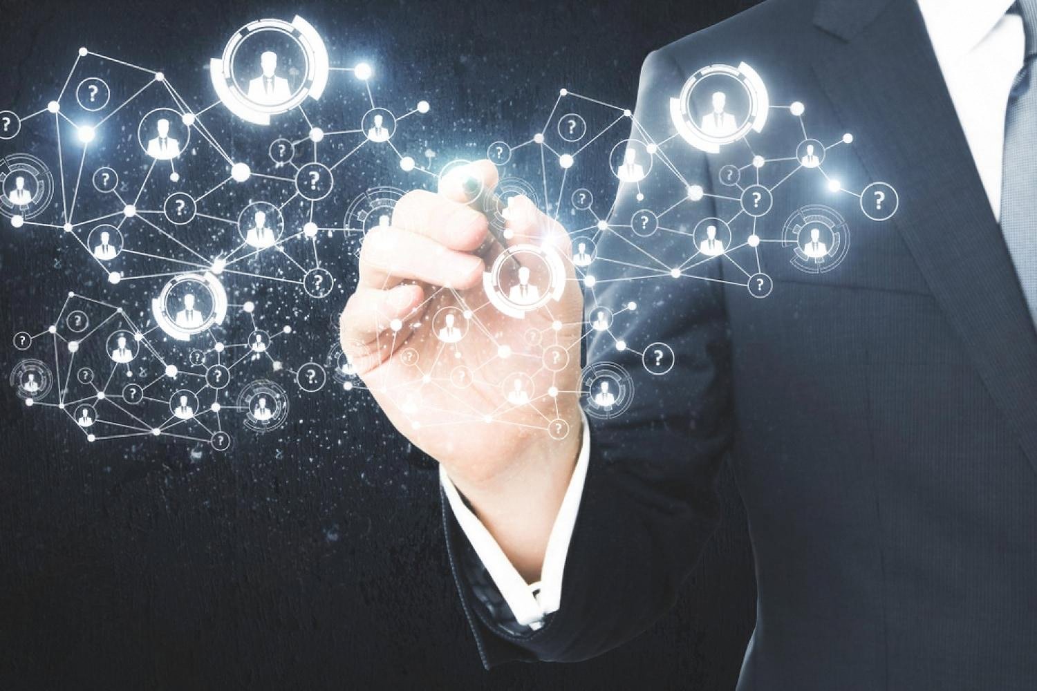 Business leader interacting with a network of employee icons representing HR analytics